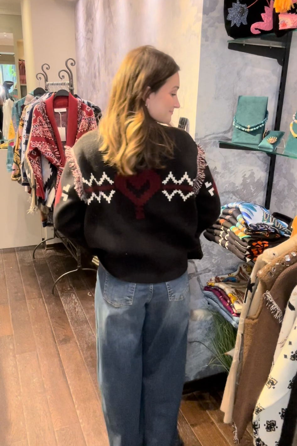 Black jacket embroidered with a burgundy heart