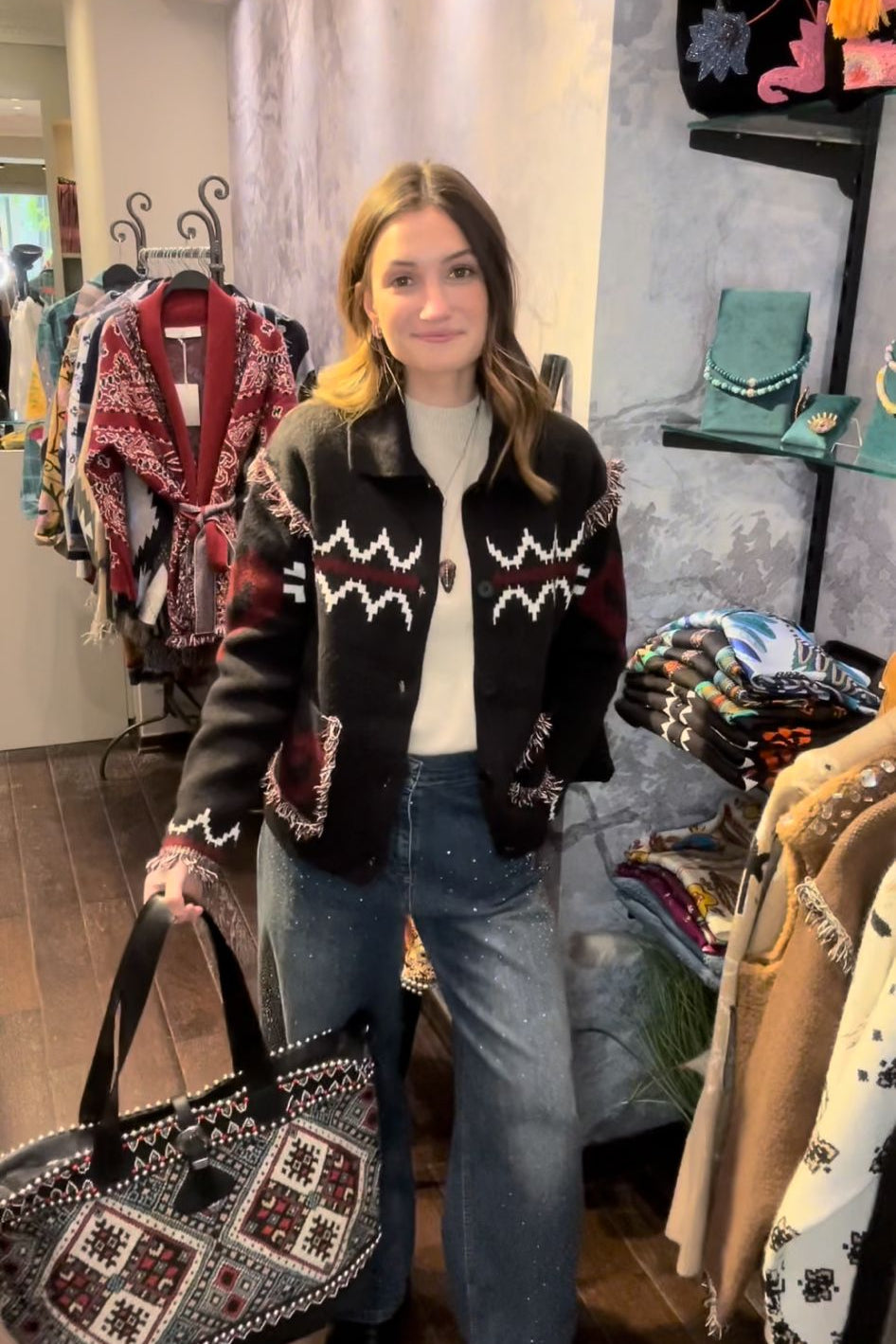 Black jacket embroidered with a burgundy heart